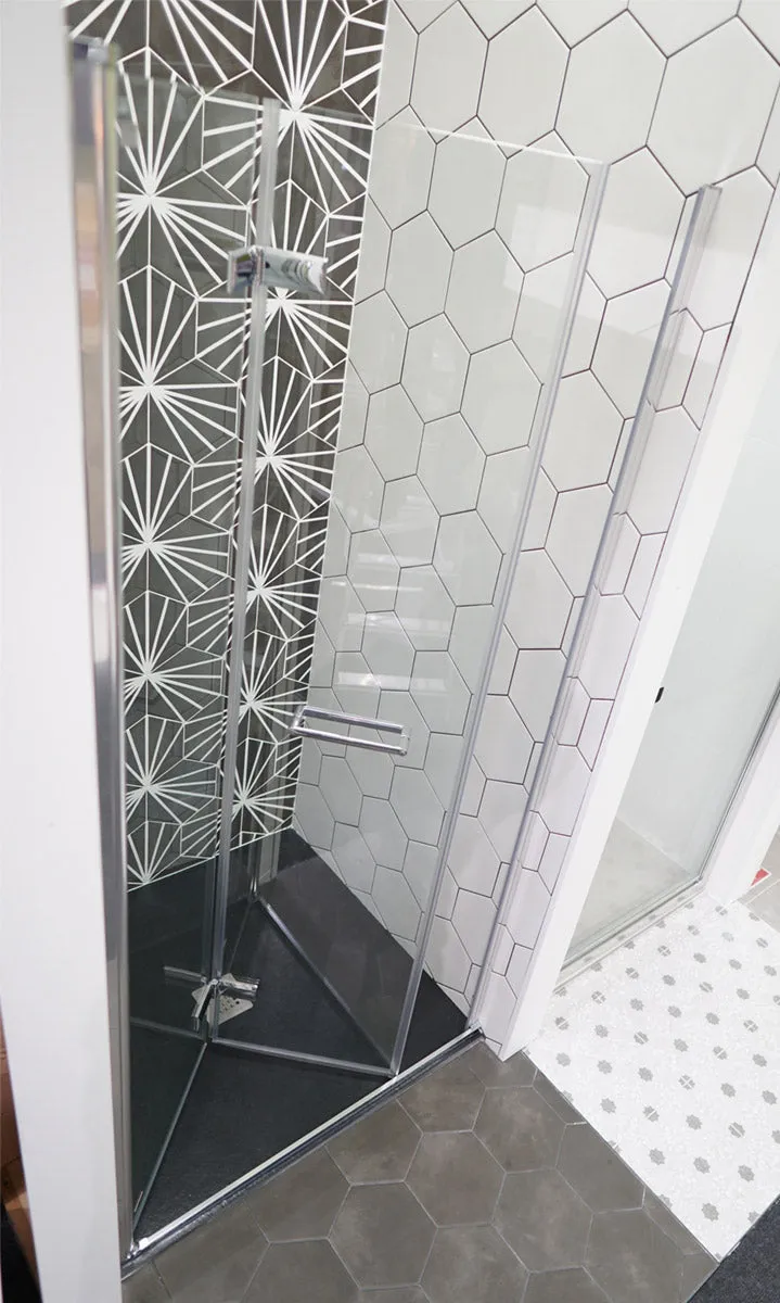 Merlyn 8 Series Frameless Bi-Fold Hinged Shower Door In Recess
