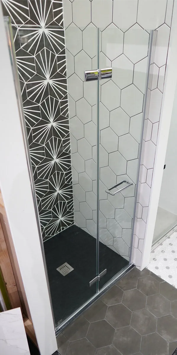 Merlyn 8 Series Frameless Bi-Fold Hinged Shower Door In Recess